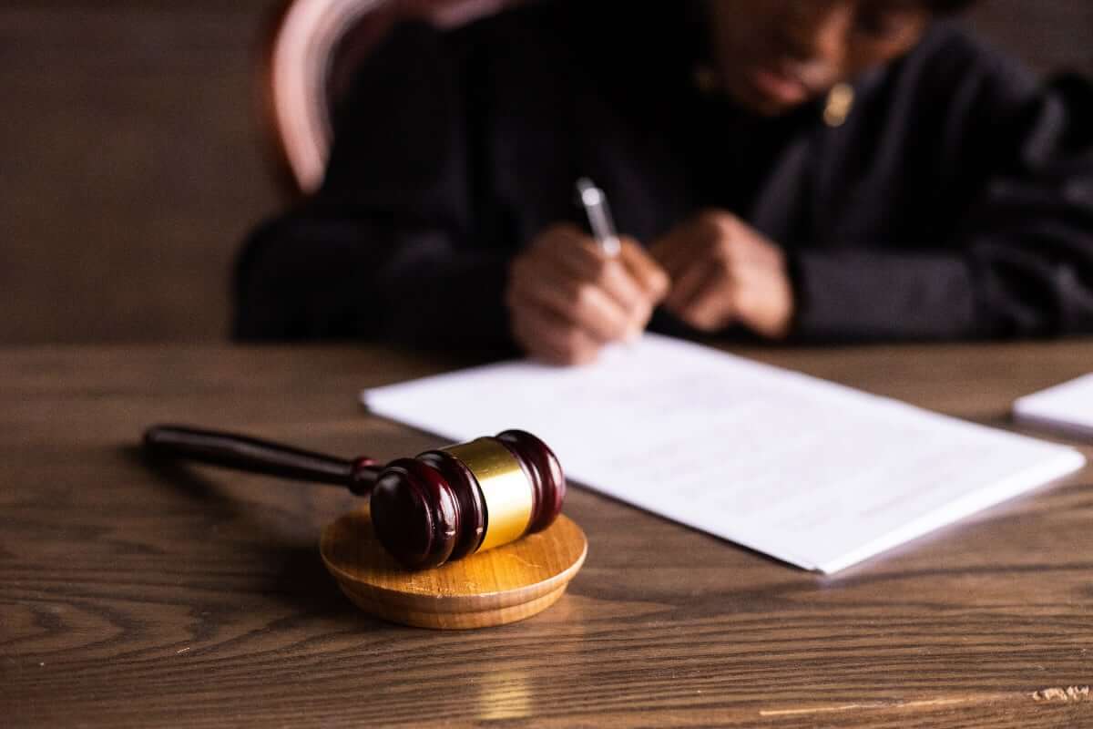 Judge signing a court order