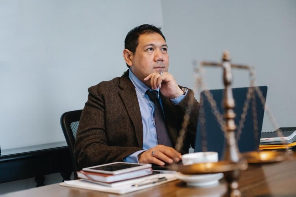 Lawyer thinking about his case