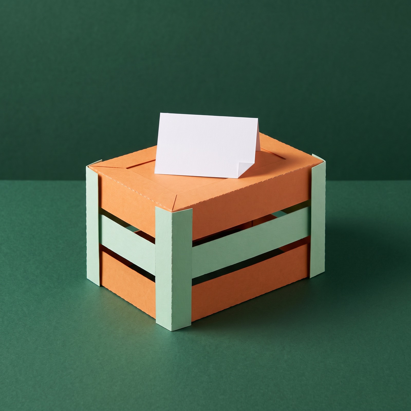 Paper sculpture of an upturned wooden crate used as a soapbox